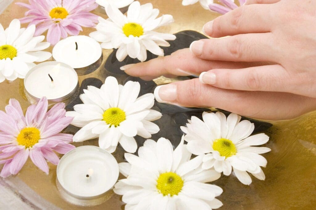 A person with their hands on top of the table